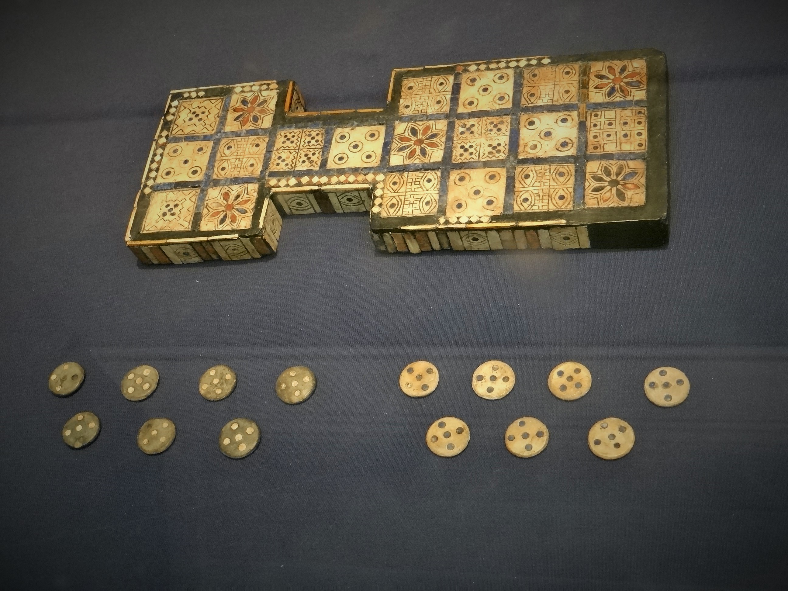 The Royal Game of Ur board in the British Museum, with twenty decorated squares and two groups of round counters.